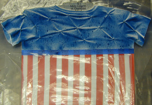 Spray top portion of shirt with blue