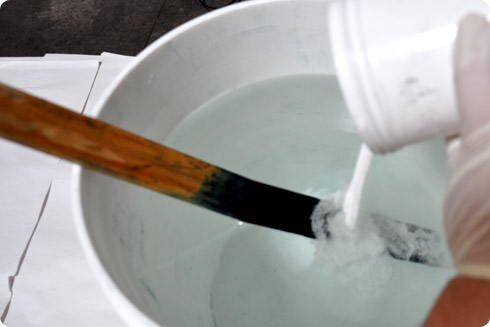 Mix in color remover and soda ash