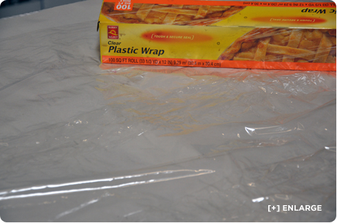 Cover workspace with plastic wrap